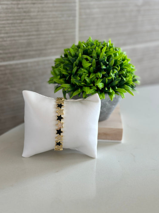 BLACK AND GOLD STAR BRACELET
